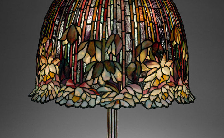Tiffany lamp with colored glass arranged in a floral design
