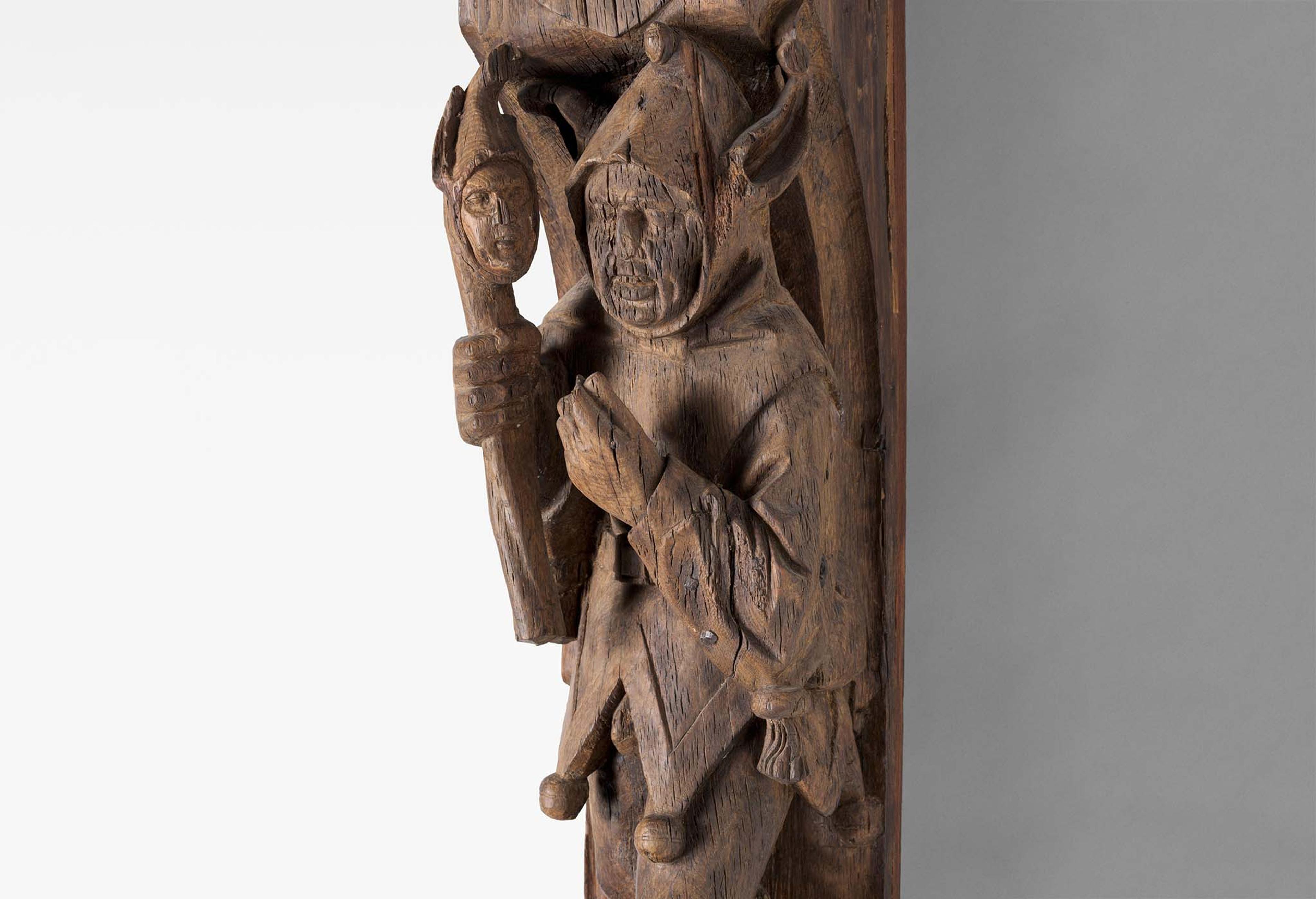 Detail of an architectural post in the form of a jester