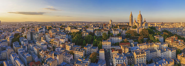 Panorama view of Montmartre Hill with Basilique du Sacre Coeur in Paris 
