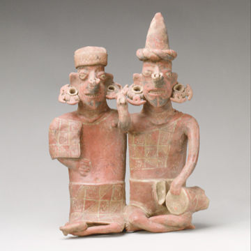 A pair of ceramic figures from ancient Mesoamerica
