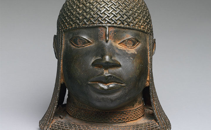 A commemorative cast-brass sculpture of an oba, or king.