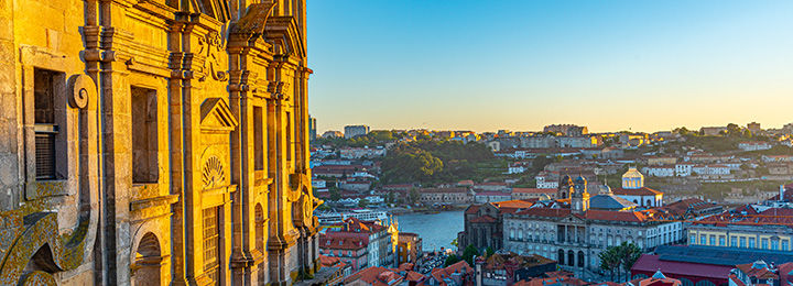 Sunset view of Saint Lawrence Church and Palacio da Bolsa at Porto, Portugal